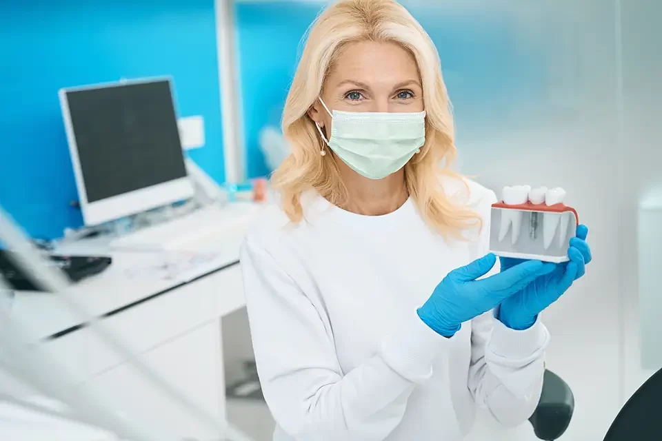 Choosing Between Dentures and Implants